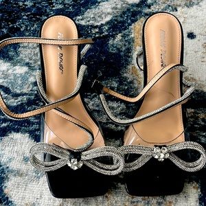 WIDE FIT BLACK WRAP AROUND DIAMANTÉ BOW SQUARE TOE HEELS